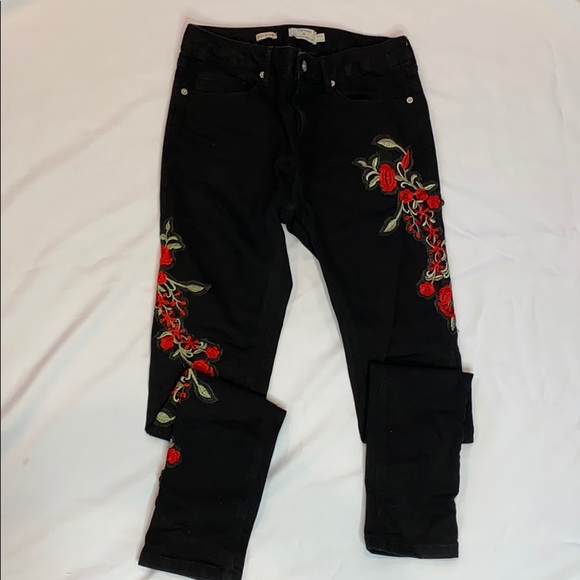 black jeans with red roses